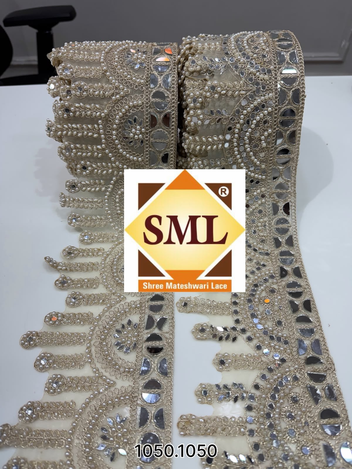Designer saree lace crafted at Shri Mateshwari Lace factory in Surat, Gujarat